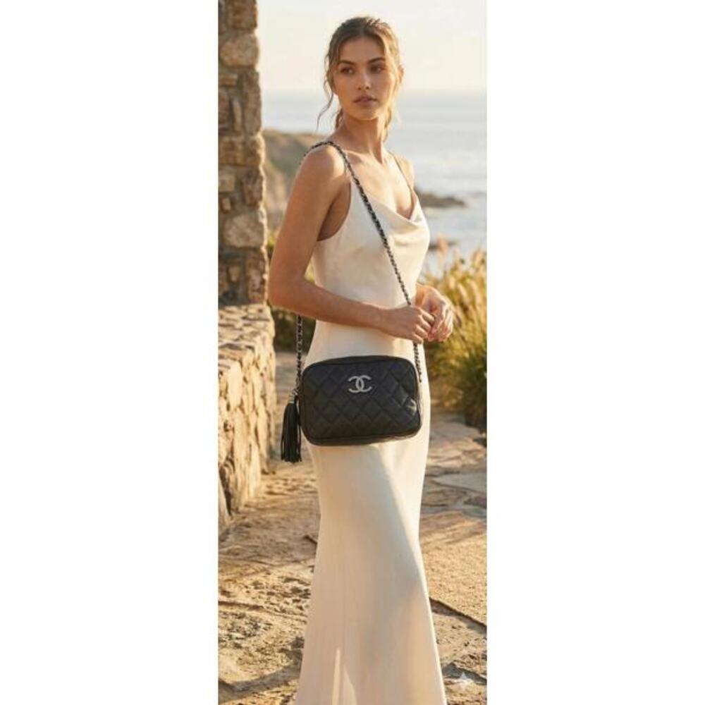 Chanel Quilted Leather CC Logo Tassel Baguette Bag